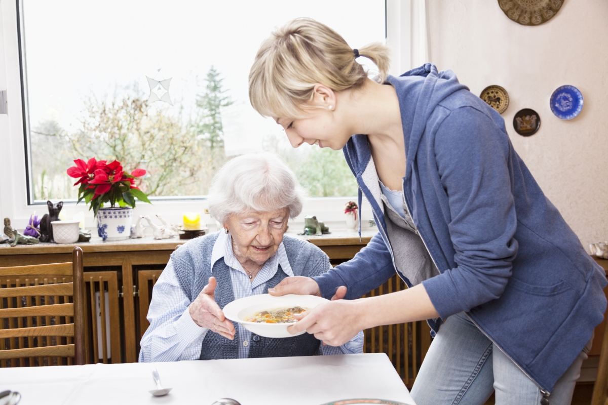 A Young Woman Prepares An Old Woman's Meal -In Home Care Sydney - ESP Healthcare