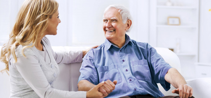 An Old Man Happily Talking To His Daughter - In Home Aged Care - ESP Solutions